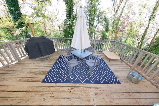 wooden deck with grilling area