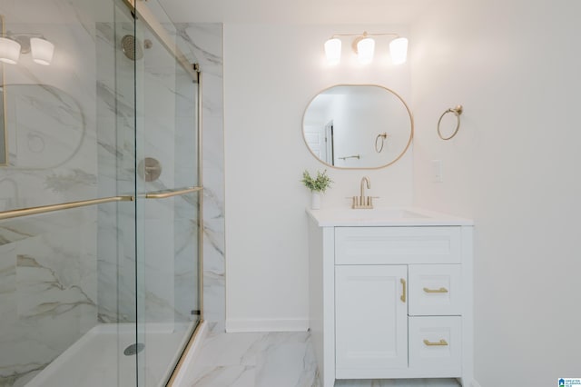 bathroom featuring vanity and a shower with shower door