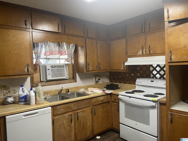 kitchen with sink, cooling unit, dark hardwood / wood-style floors, and white appliances