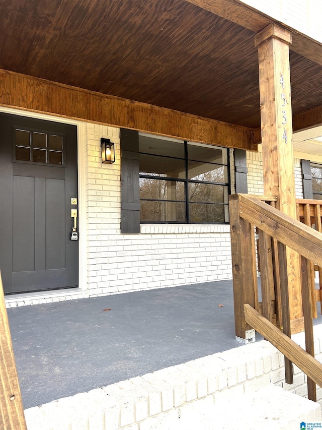 property entrance with a porch