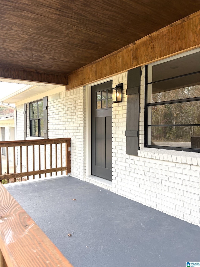 property entrance featuring covered porch