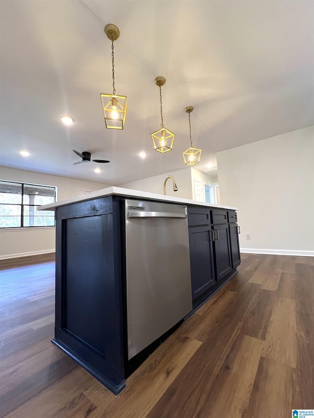 kitchen featuring ceiling fan, dishwasher, hanging light fixtures, and dark hardwood / wood-style floors