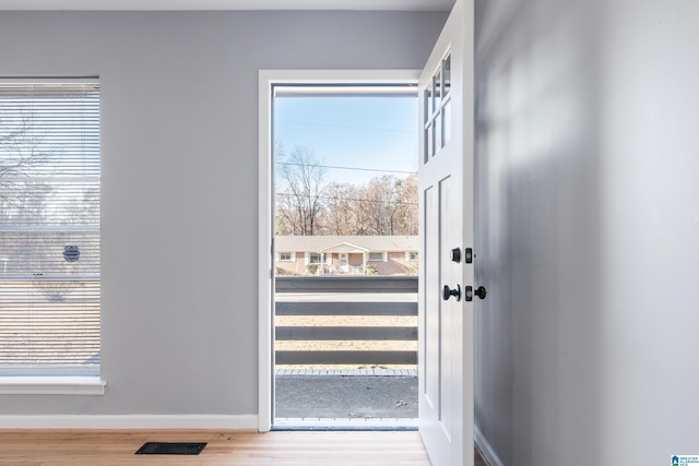 doorway featuring light hardwood / wood-style floors