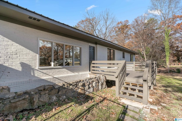 exterior space with a wooden deck