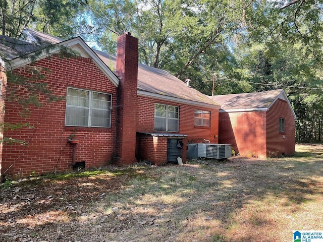 6358 State Highway 129, Winfield, AL 35594 - view of side of home with a yard and central AC unit