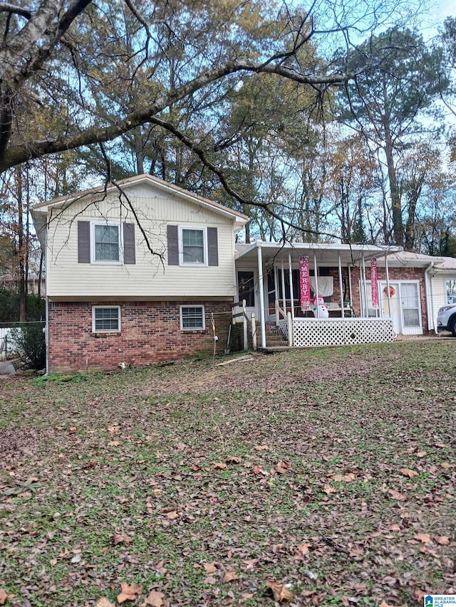 split level home with a porch