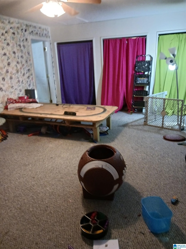 bedroom featuring carpet flooring and ceiling fan