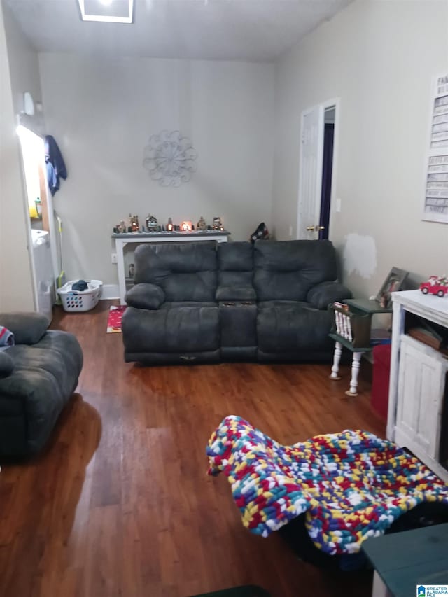 living room featuring dark hardwood / wood-style floors