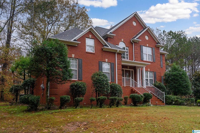 view of property with a front lawn