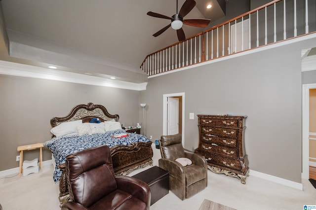 carpeted bedroom with a towering ceiling, ceiling fan, and ornamental molding