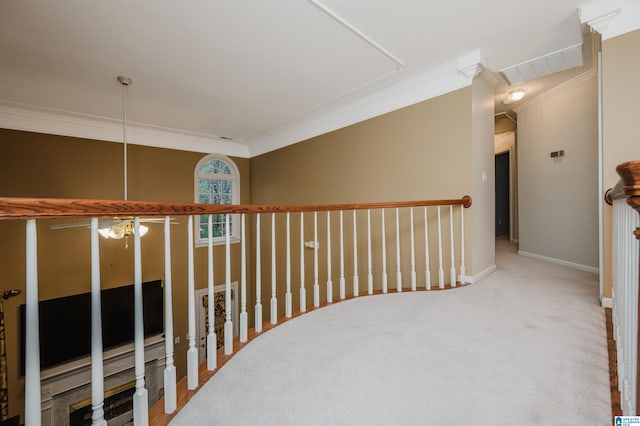 hallway featuring carpet floors, a baseboard radiator, and ornamental molding