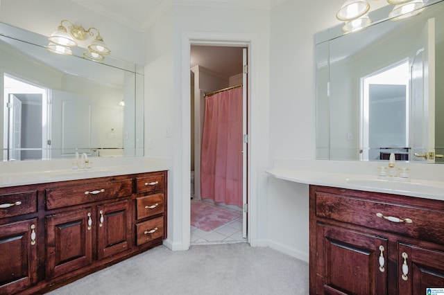 bathroom with vanity and crown molding