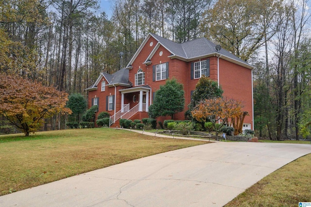 view of property with a front lawn