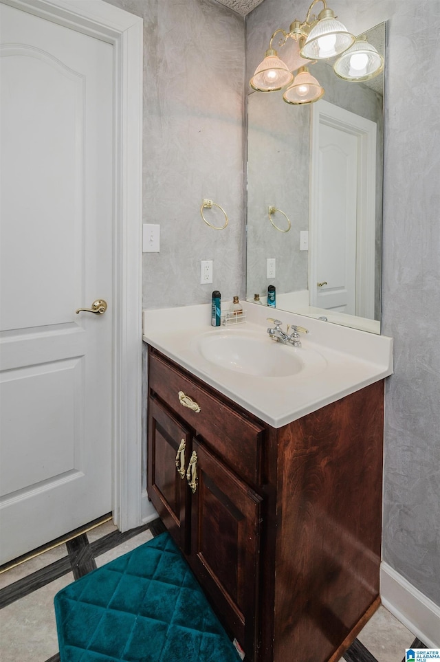 bathroom with tile patterned floors and vanity