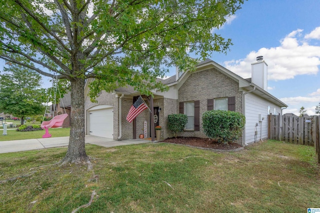 view of front facade featuring a garage and a front lawn