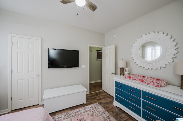 bedroom featuring dark hardwood / wood-style flooring and ceiling fan