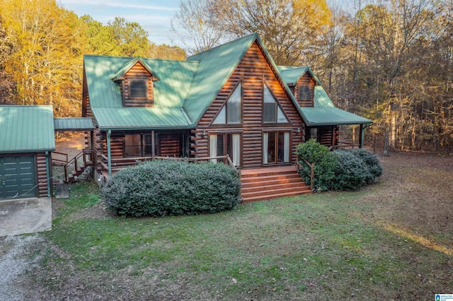 view of front of house with a porch and a front yard