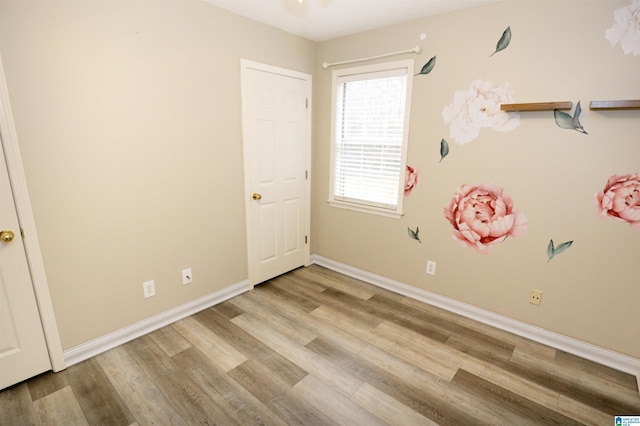 unfurnished bedroom with light hardwood / wood-style floors