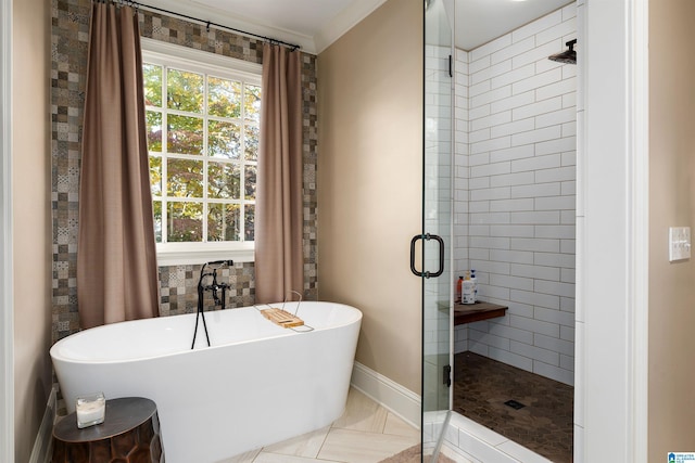 bathroom featuring tile patterned flooring, plus walk in shower, and ornamental molding