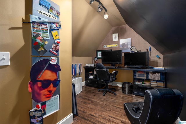 office area featuring lofted ceiling and hardwood / wood-style flooring