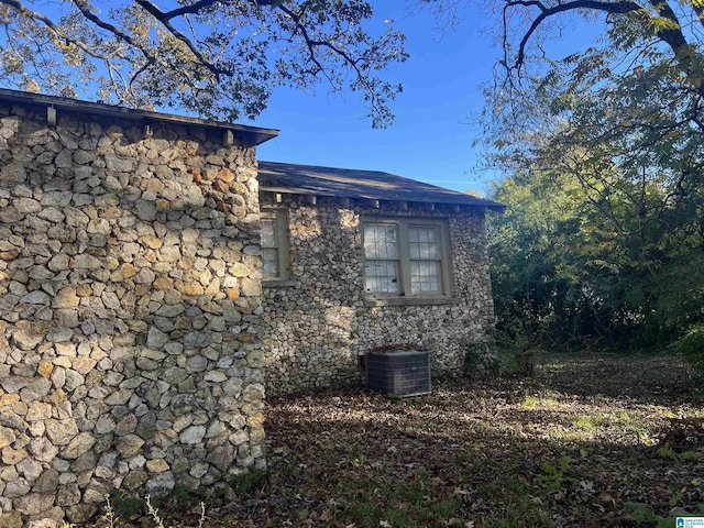 view of home's exterior featuring cooling unit