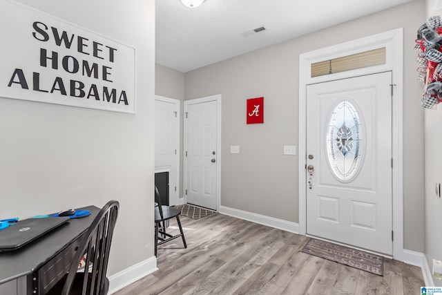 entrance foyer featuring light hardwood / wood-style floors