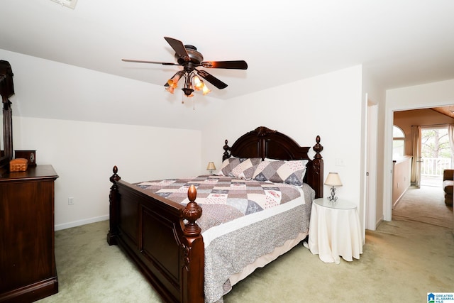 bedroom featuring ceiling fan and light colored carpet