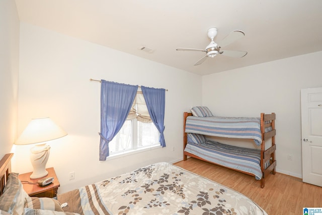 bedroom featuring wood-type flooring and ceiling fan