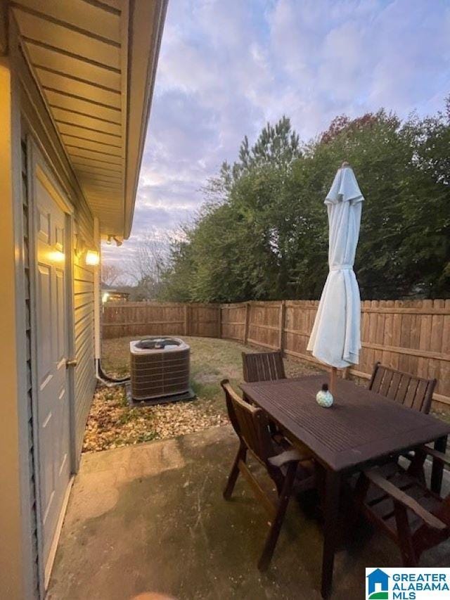 patio terrace at dusk with central AC