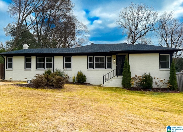 ranch-style home with a front yard