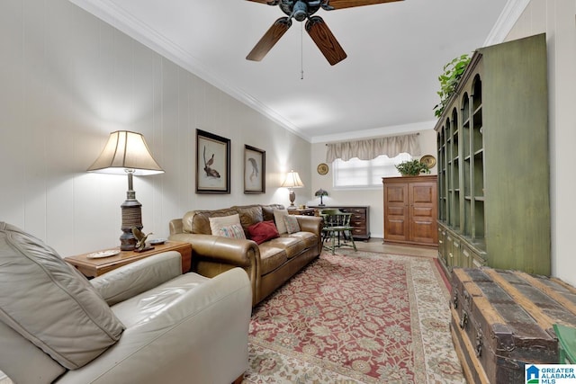 living room with crown molding and ceiling fan