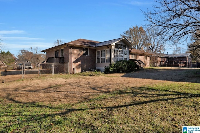 view of property exterior featuring a yard