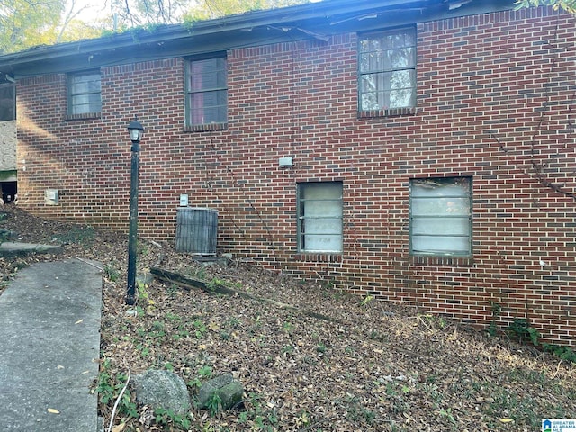 view of home's exterior featuring cooling unit