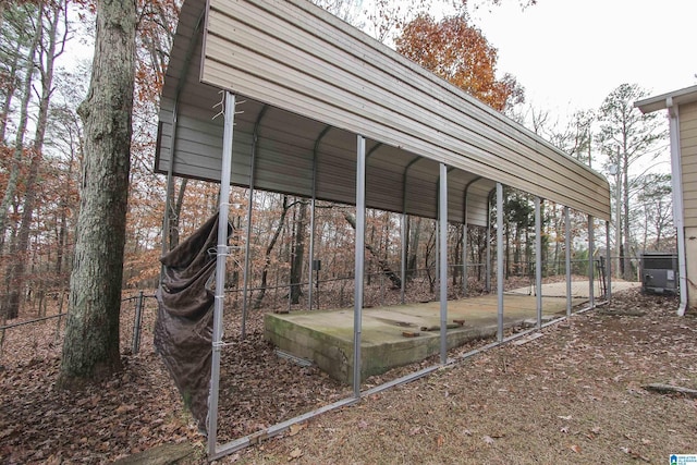 view of vehicle parking with a carport