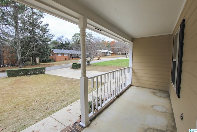 balcony featuring covered porch