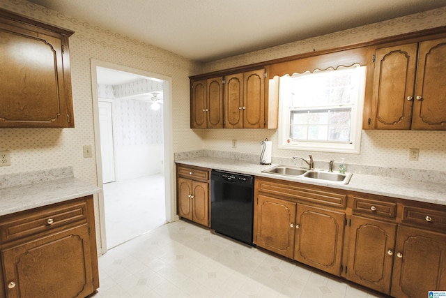 kitchen featuring sink and black dishwasher