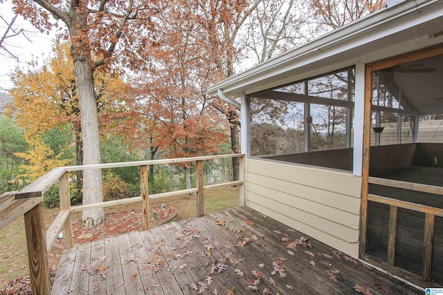 wooden terrace with a sunroom