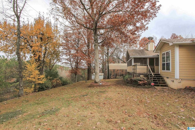 view of yard with a sunroom