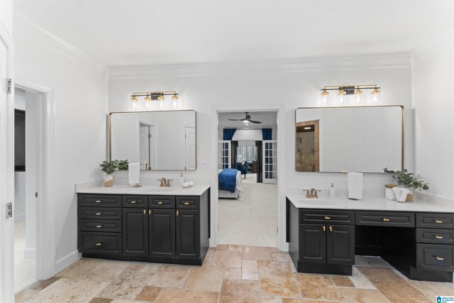 bathroom with vanity, ceiling fan, and crown molding