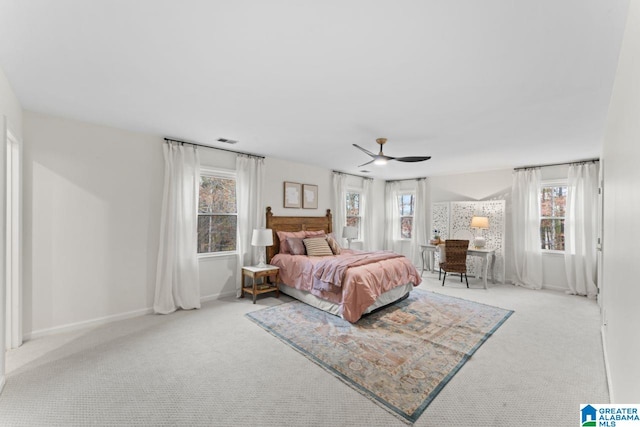 carpeted bedroom featuring ceiling fan