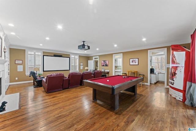 rec room with hardwood / wood-style flooring, crown molding, and billiards