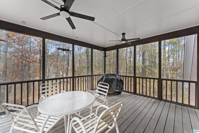 sunroom / solarium with ceiling fan