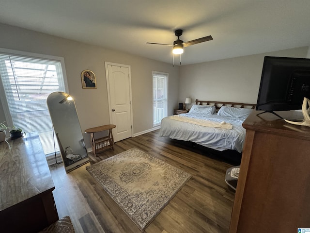 bedroom featuring ceiling fan and dark wood-type flooring