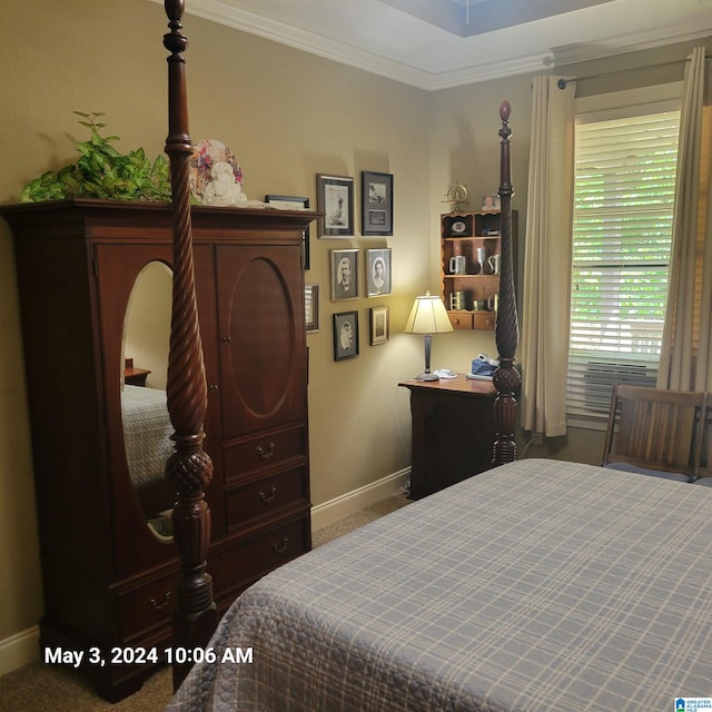 bedroom with carpet floors, baseboards, and ornamental molding