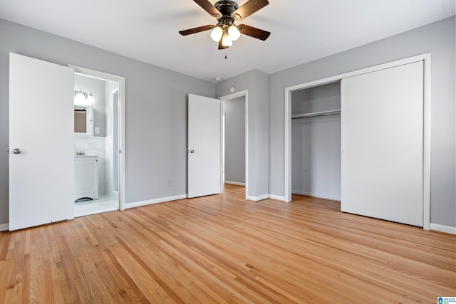 unfurnished bedroom with connected bathroom, ceiling fan, a closet, and light hardwood / wood-style floors