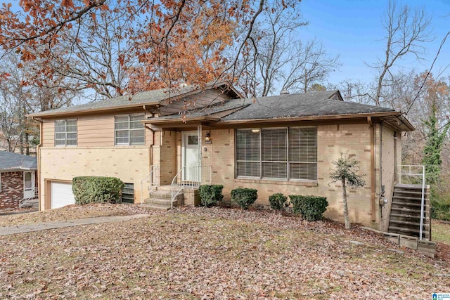 tri-level home featuring a garage