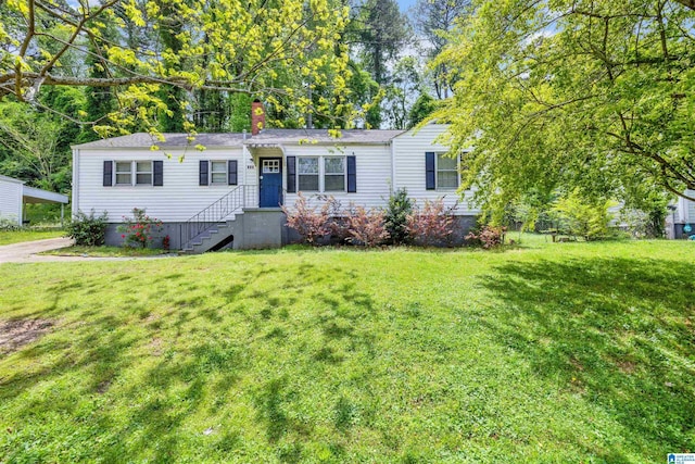 view of front of home with a front lawn