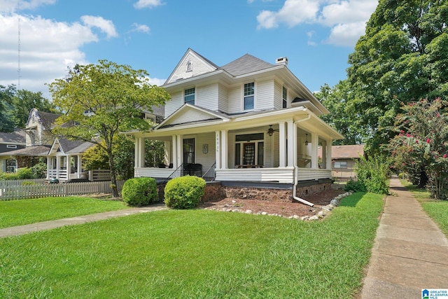 view of front of property featuring a porch and a front lawn