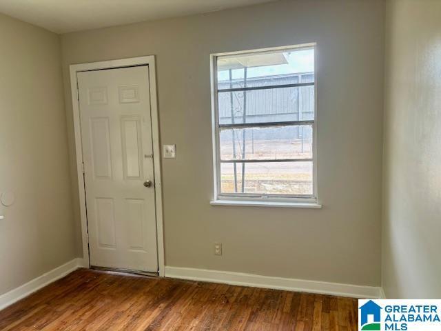 interior space with hardwood / wood-style flooring and a wealth of natural light