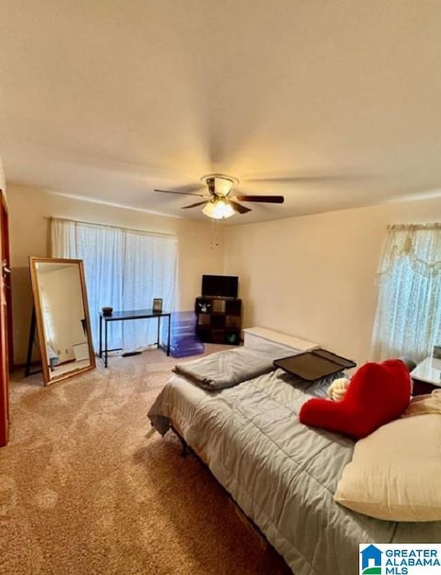 bedroom featuring carpet flooring and ceiling fan